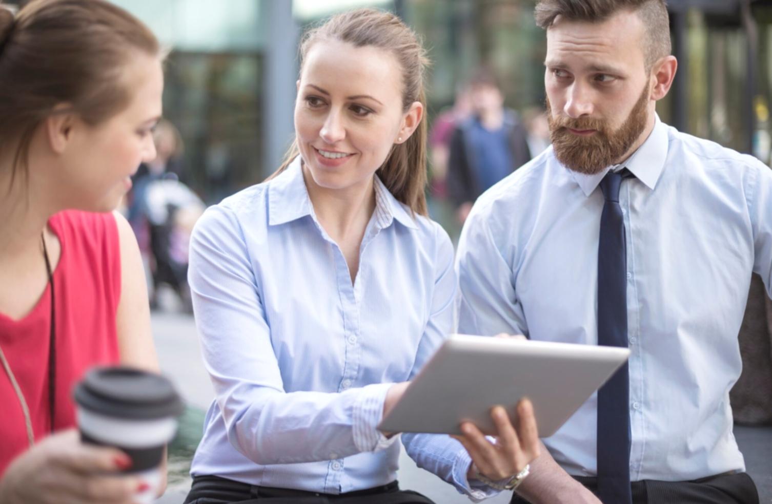 Student reviewing financial reports and variance analysis charts during remote learning session